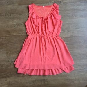 Coral sundress with ruffle details